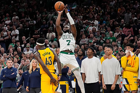Jaylen Brown puts up a 3-point shot